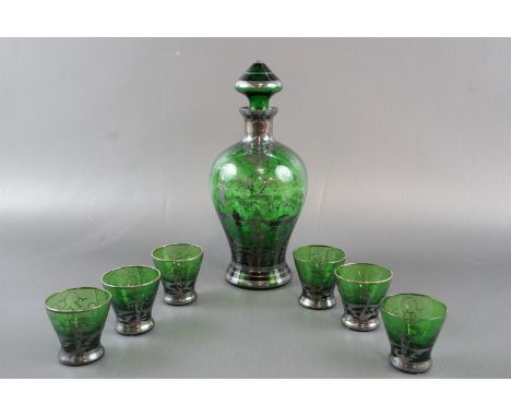 A Venetian silvered emerald glass liqueur set comprising a decanter and six glasses