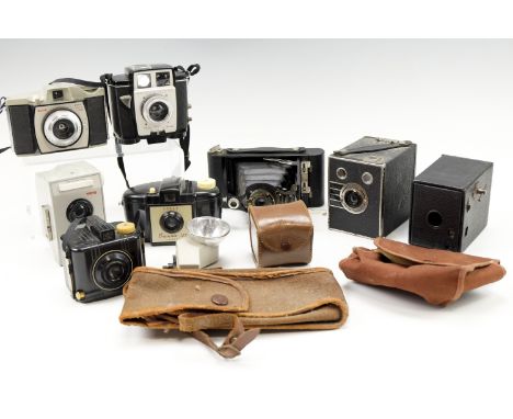 A group of vintage Kodak cameras and accessories, including a No 2 Folding Cartridge Premo, a Brownie Portrait, 127, Twin 20,