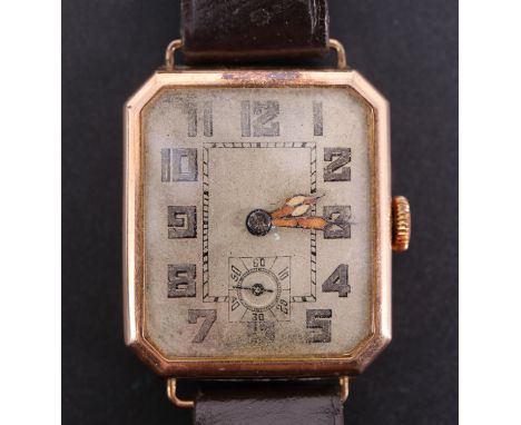 An Art Deco 9ct gold wristwatch, having a 15 jewel movement and mat silver dial having a seconds ring at six o'clock, in a re