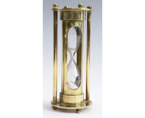 A vintage brass hourglass, 18 cm 