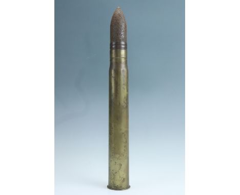 An inert late 19th / early 20th Century Elswick Ordnance Company 3-pounder artillery shell and case