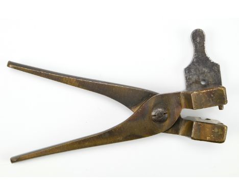 A Victorian pistol shot mould stamped R Jackson, Edgeware Road