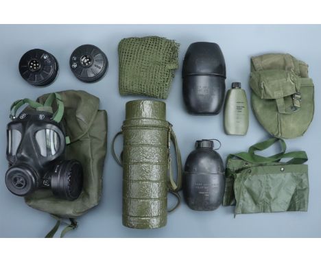A quantity of largely post-War British army equipment including an S6 respirator and pouch