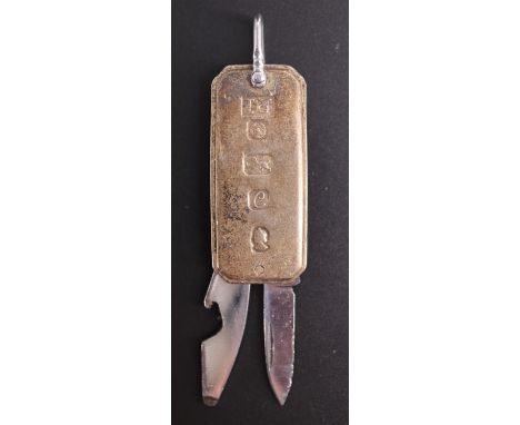 A 1977 QEII Silver Jubilee key-ring folding knife having silver grip scales with oversized assay marks, 4.5 cm excluding bale
