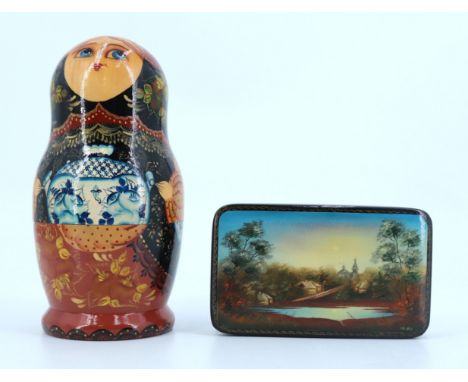 A vintage Russian lacquered Matryoshka doll together with a lacquered table box, doll 17 cm 