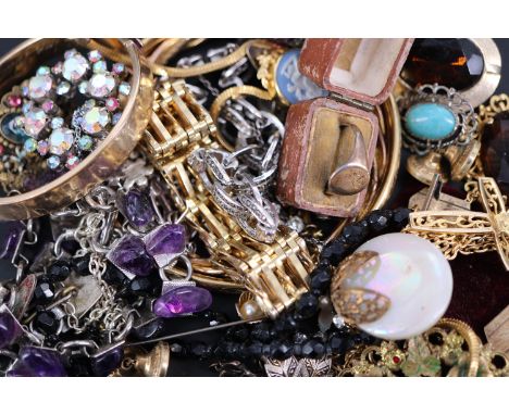 A small collection of vintage costume jewellery together with a hat pin