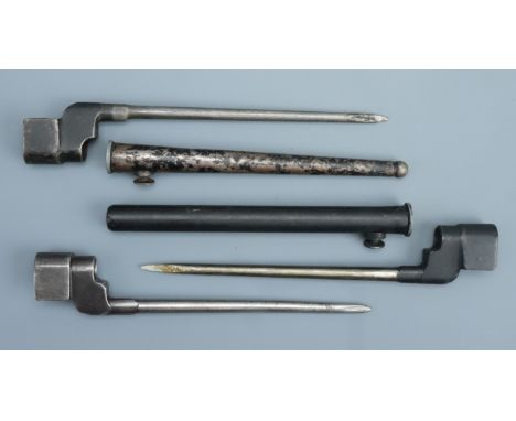 Three Second World War British No 4 Mk II bayonets, one in tubular steel variant scabbard