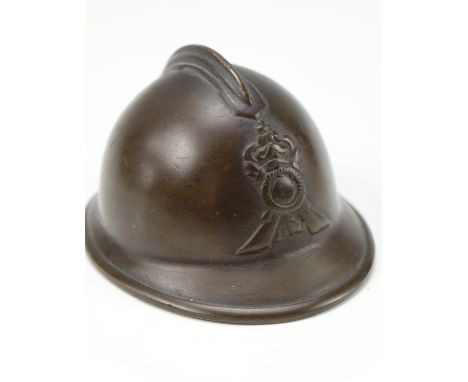 A bronzed miniature Italian army Adrian pattern helmet, 10 cm x 8 cm x 5.5 cm