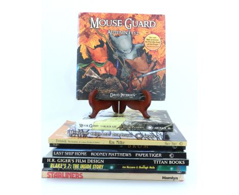 A quantity of books relating to graphic novels and science fiction, including "Starliners", "Blake's 7", "H R Giger's Film De