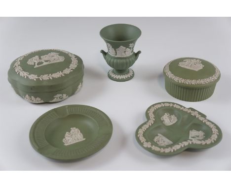 A small group of Wedgwood green Jasperware, including two lidded pots, an ashtray, etc, tallest 8.5 cm