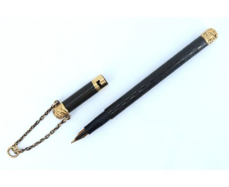 An early 20th Century Swan ( Mabie Todd and Bard ) chatelaine fountain pen, eye-dropper fill and having a bayonet cap on a ch