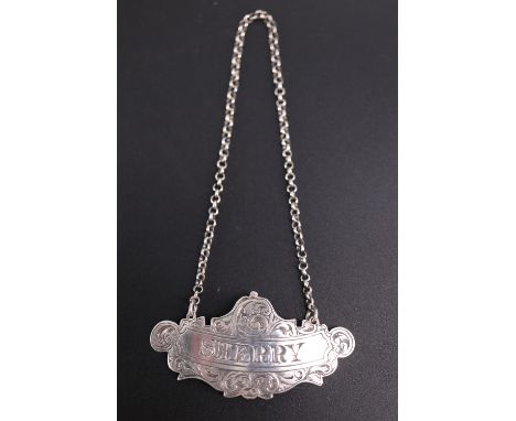 A Victorian silver Sherry decanter label, George Unite, Birmingham, 1865, 6 cm