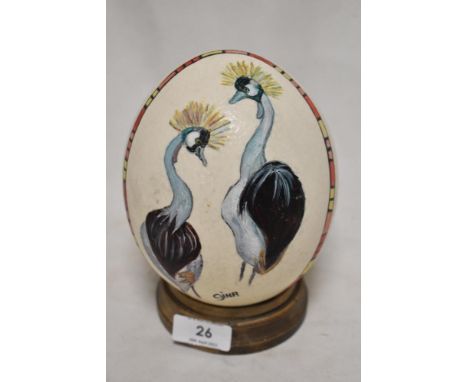 A vintage Ostritch egg having been hand decorated with an Emu design.