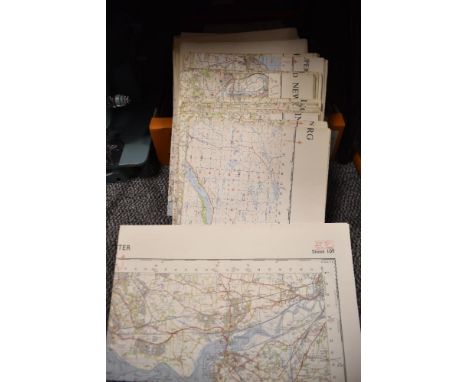 A stack of vintage ordnance survey guides and maps of Northern England.