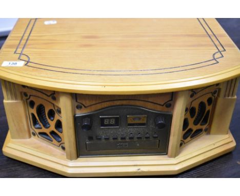 A modern Phonograph model GF665 record player with compact disk and radio cassette.