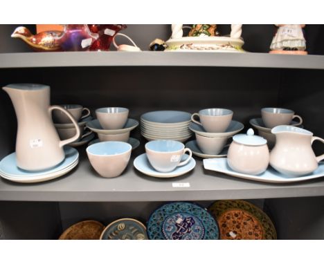 An Art Deco style Poole Pottery C104 pattern part tea and coffee service.