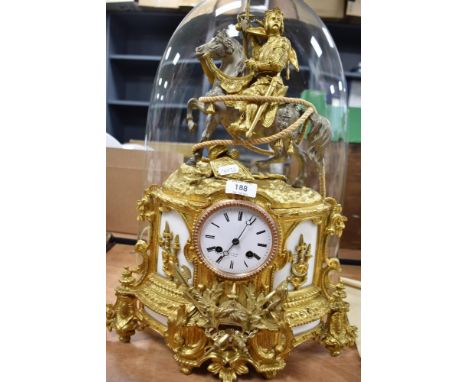 An impressive French Victorian Henry Marc A Paris, domed mantel clock having a cast brass and ormolu decorated with a crusade