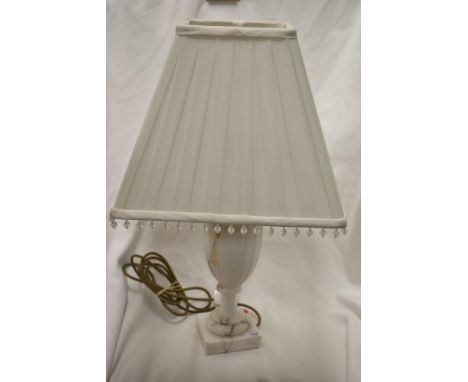 A vintage marble stone carved lamp base with square shade.