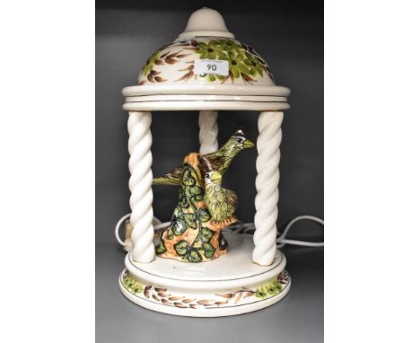 A mid century Derek Fowler pottery lamp in the form of a garden pagoda.