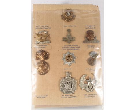 Ring binder folder containing KOSB, Cameronians, Royal Scots, Gordon Highlanders, Queens Own Cameron Highlanders, Seaforth Hi