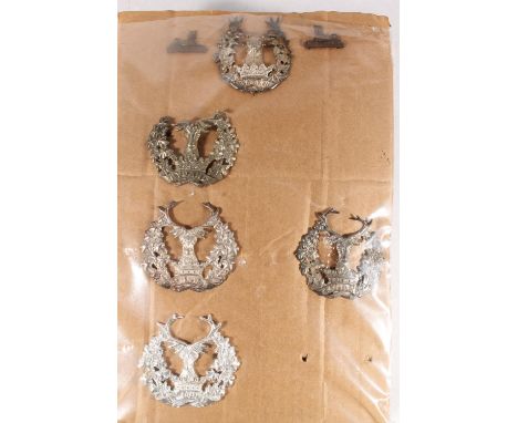 Ring binder folder containing Gordon Highlanders, Cameron Highlanders and Argyll and Sutherland Highlanders insignia to inclu