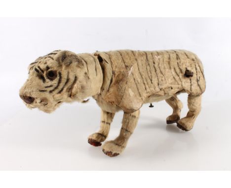 Antique clockwork automaton in the form of a tiger, in the manner of Roullet & Decamps, 35cm long. Cannot guarantee working c