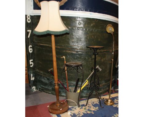A Mid 20th Century oak standard lamp &amp; shade , together with a brass free standing reading light, and two wrought iron ja