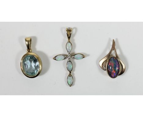 A 9ct gold opal pendant and two other pendants, 3.5gm 