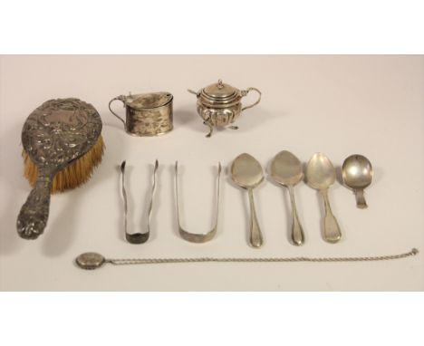 A George III silver caddy spoon, Birmingham 1812, tow pairs of Georgian sugar tongs, two silver mustard pots and other silver