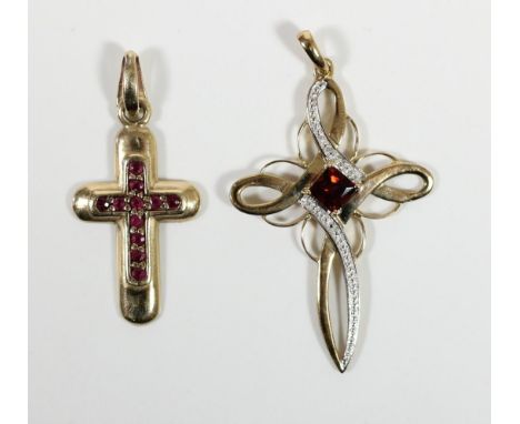 A 9ct gold ruby and diamond cross pendant and a garnet cross pendant, 3.7gm 