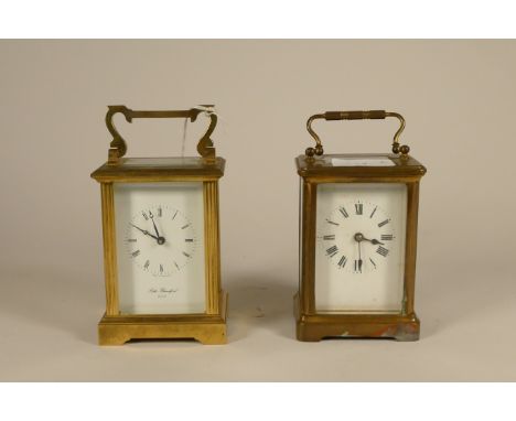 A Robert Blandford brass carriage clock, with Roman numeral dial, together with a similar French brass carriage clock (2)