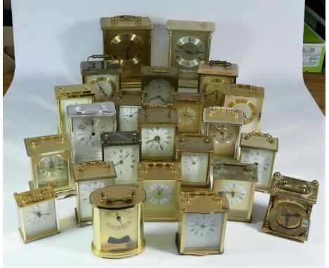A collection of clocks to include, a Robt. Blandford 1873 quartz carriage clock, a Smiths quartz carriage clock, a St.James, 