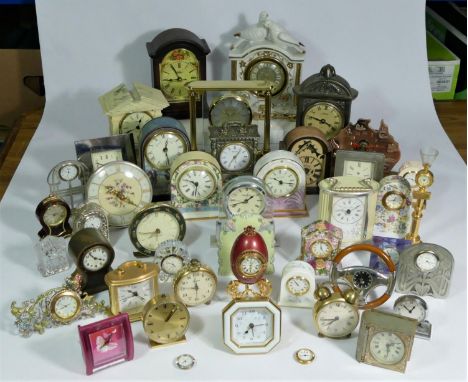 A collection of clocks to include, a Smiths sectric wall clock, a Westclox alarm clock, a Rhythm quartz mantel clock, togethe
