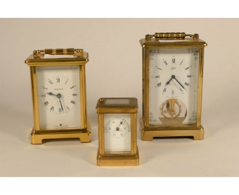 A miniature brass carriage clock style barometer, together with a Bayard brass carriage clock, made in France, together with 