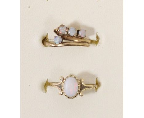 A 9ct gold opal single stone ring, J and another opal ring, K, 2.1gm 