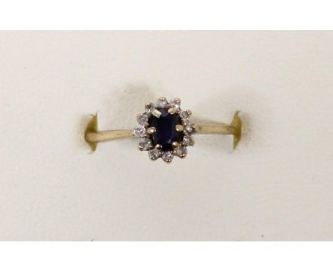 A 9ct gold sapphire and diamond cluster ring P, 1.5gm 