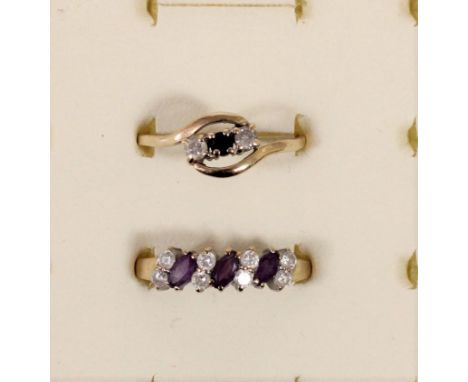 A 9ct gold sapphire and white stone ring, R and a n amethyst and white stone ring T 1/2, 3gm 