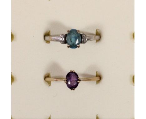 A 9ct white gold, probably blue topaz and diamond ring, P 1/2 and a 9ct gold amethyst ring, R, 3gm 