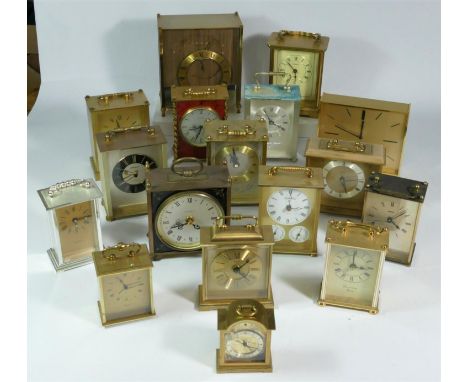 A collection of clocks to include, three lantern clock, a Seiko quartz carriage clock, together with other quartz clocks (3) 