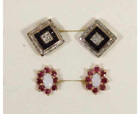 A pair of 9ct gold opal and garnet ear studs and a pair of sapphire ear studs 