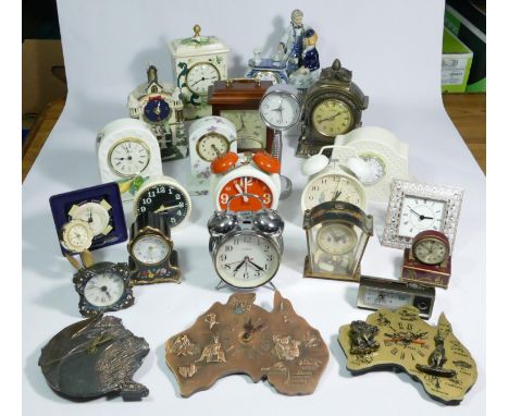 A collection of clocks to include, a Jerger alarm clock, a Juliana quartz mantel clock, a Masons ceramic mantel clock, togeth
