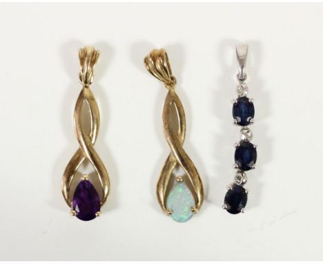 A 9ct gold opal drop pendant, a similar amethyst example and a sapphire pendant, 2.5gm. 