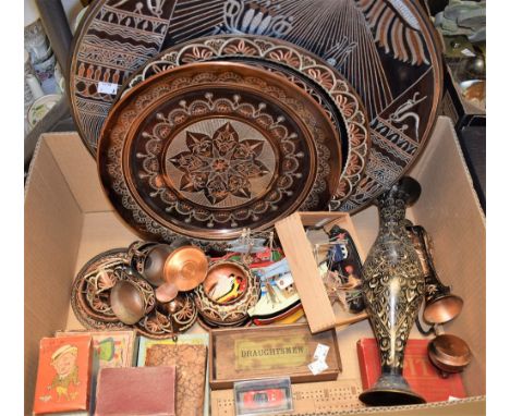 An early 20th century cribbage board, similar games, card games, miniature model boats, a large copper charger, chased and en