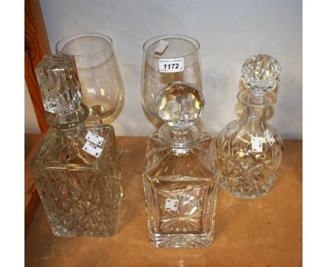 A cut glass decanter; two others similar; etc (5)