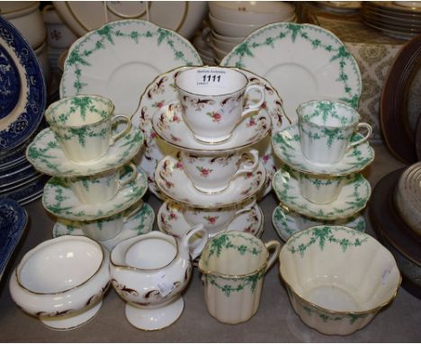 Ceramics - a Tuscan part tea service, green swags on a white ground, comprising six cups, six saucers, six side plates, bread