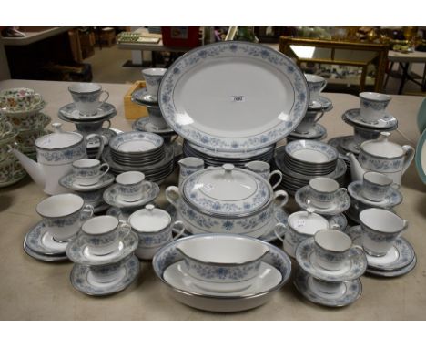 A comprehensive Noritake Blue Hill pattern tea and dinner service comprising dinner plates, salad plates, side plates, bowls,