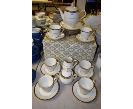 A Noritake Elysee pattern tea set for six comprising tea pot, cream jug, sugar bowl, side plates, cups and saucers, boxed