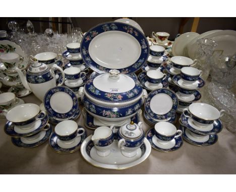 A comprehensive Wedgwood Blue Siam pattern dinner and coffee service comprising dinner plates, salad plates, side plates, cup