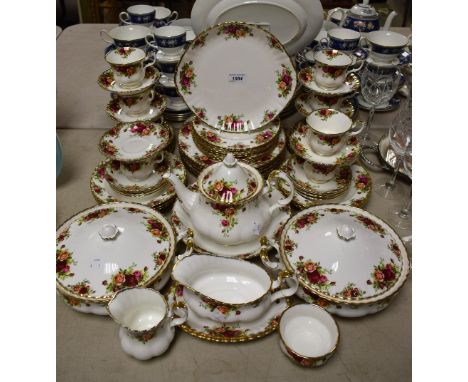 A comprehensive Royal Albert Old Country Roses dinner and tea service comprising plates, side plates, salad plates, bowls, ve