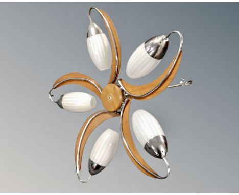 A 1970's plywood and chrome five way light fitting with glass shades.